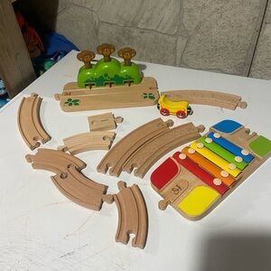 Hape train set with monkeys and xylophone pieces